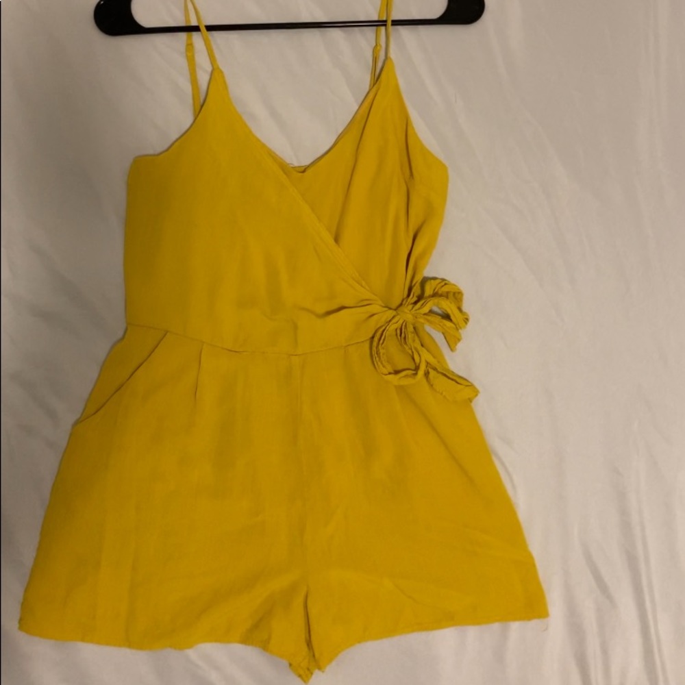 it's a yellow bodysuit, size small